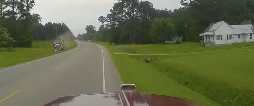 VIDEO: Trucker rides an open drainage ditch like a bucking bronco 